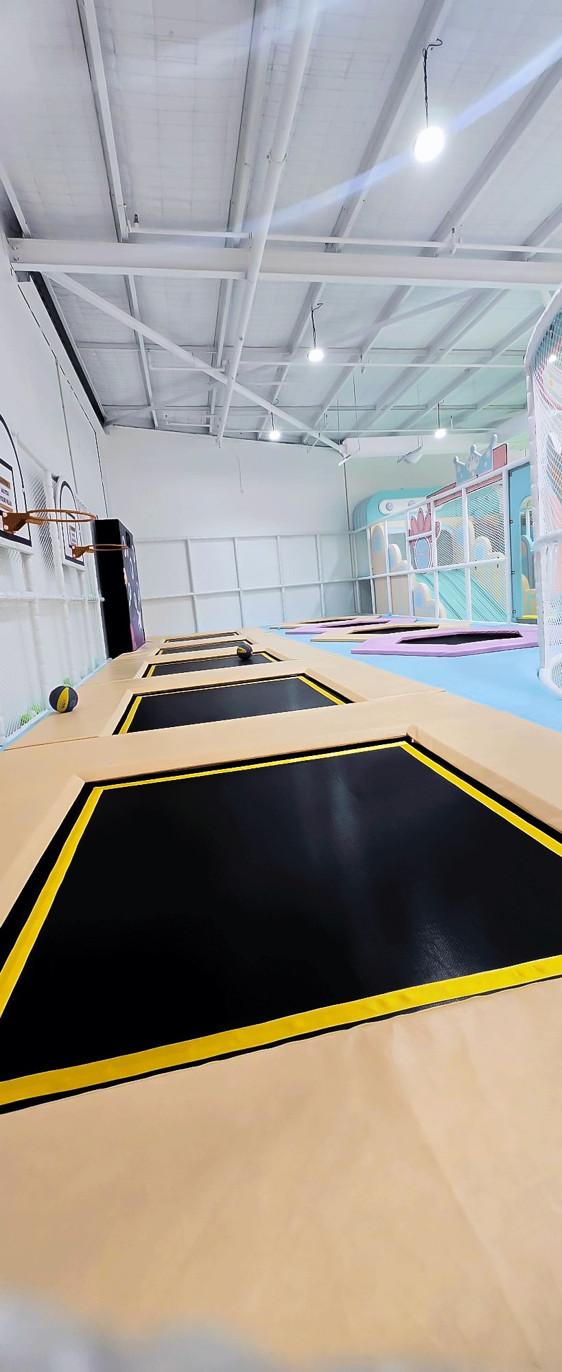 The trampoline lane with a basketball hoop